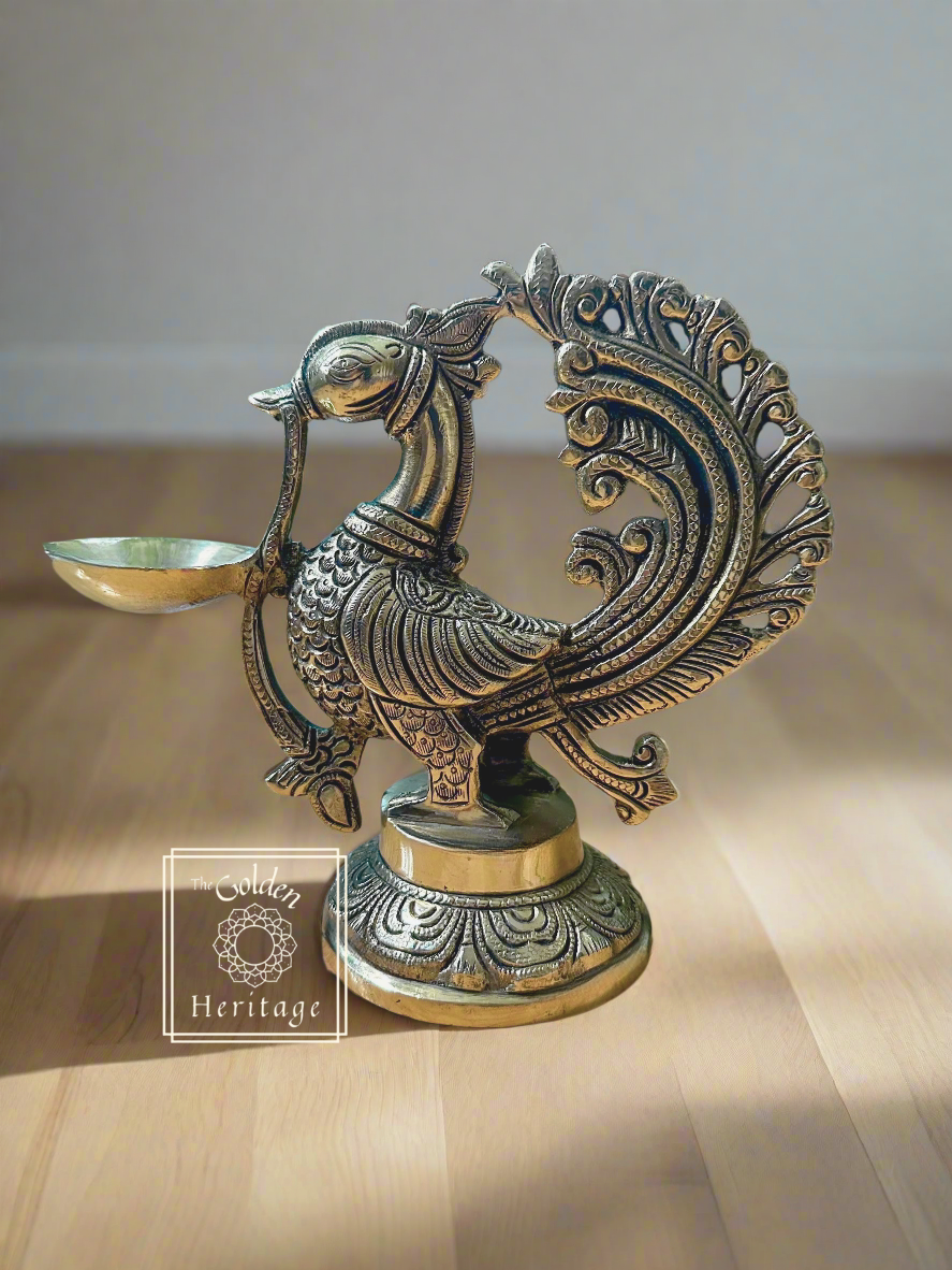 Brass Peacock Oil Lamp, Peacock Carved Diya - The Golden Heritage #