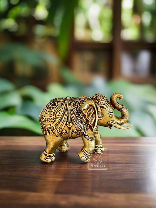 Handmade brass elephant figurine, symbolizing strength and wisdom, ideal for home decor and gifting.