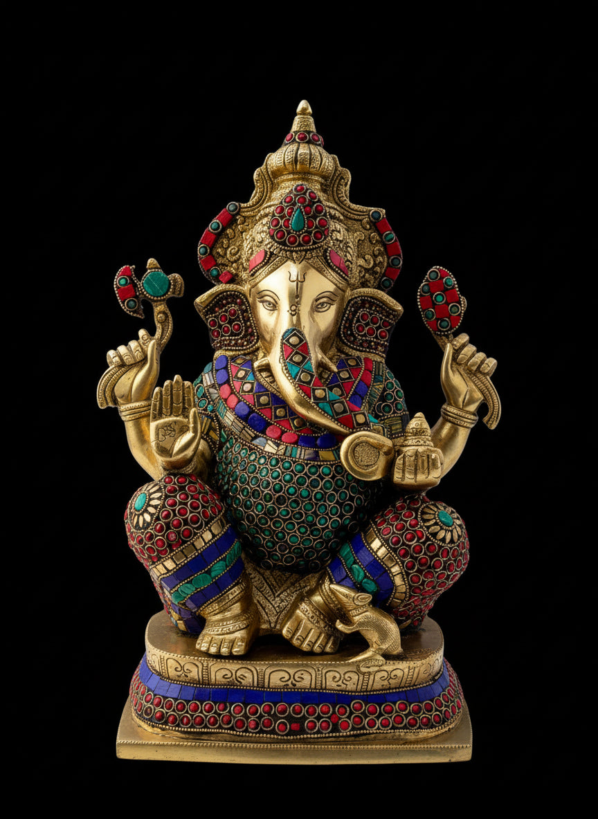 Colorful Ganesha statue with intricate designs created by stonework.