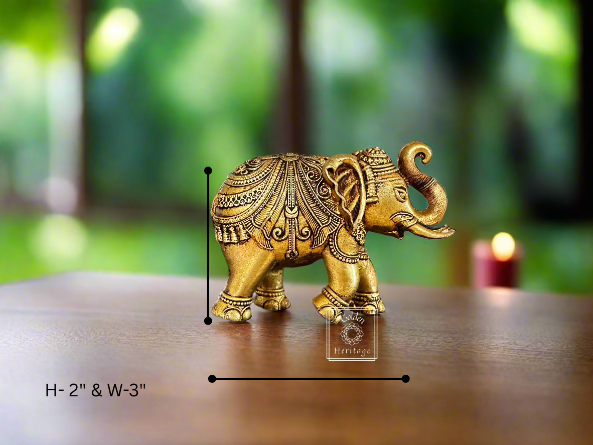Handmade brass elephant figurine, symbolizing strength and wisdom, dimensions 2" height and 3" width.
