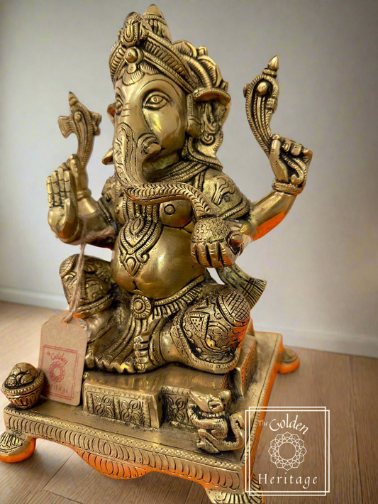 Ganesha Statue in Classic Pose & eating Laddu - The Golden Heritage #