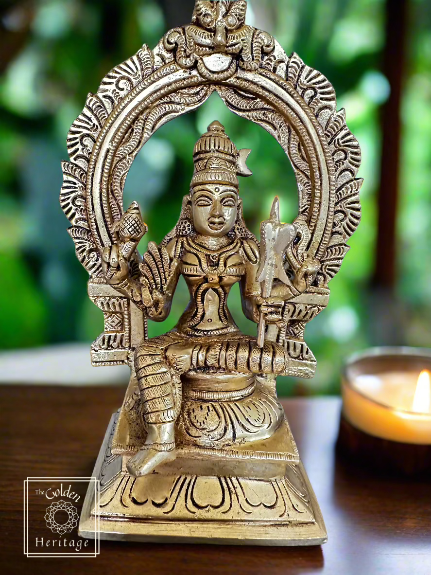 Decorative statue of a seated figure with intricate details. Goddess Rajarajeshwari, Lalita Tripura Sundari or Lalita