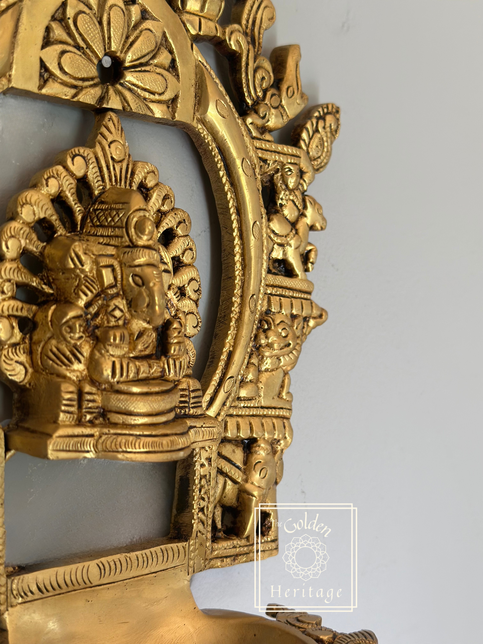Sukhasana Ganapati with Prabhavali frame Diya