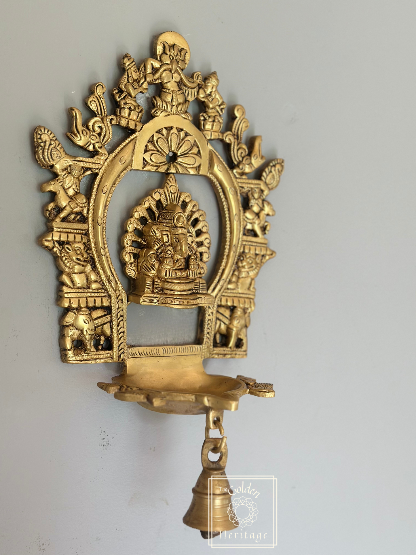 Sukhasana Ganapati with Prabhavali frame Diya