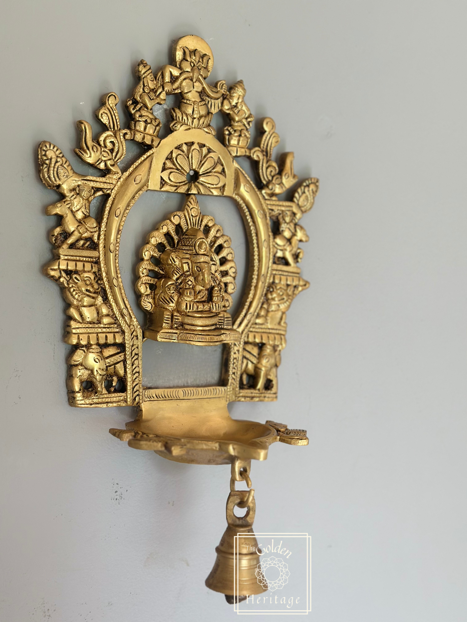 Sukhasana Ganapati with Prabhavali frame Diya