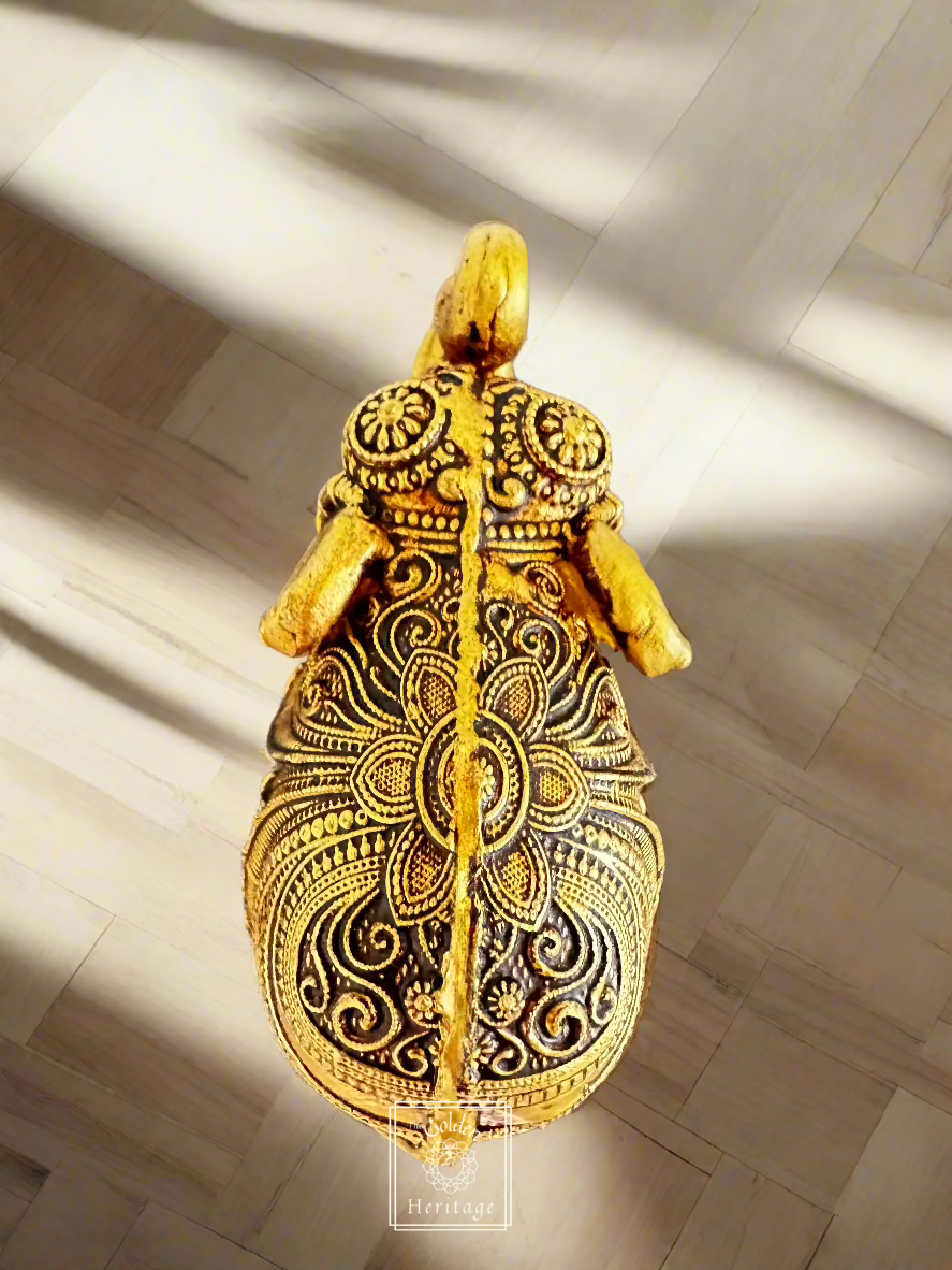 Handmade brass elephant sculpture with intricate detailing, symbolizing strength and wisdom, perfect for home decor.