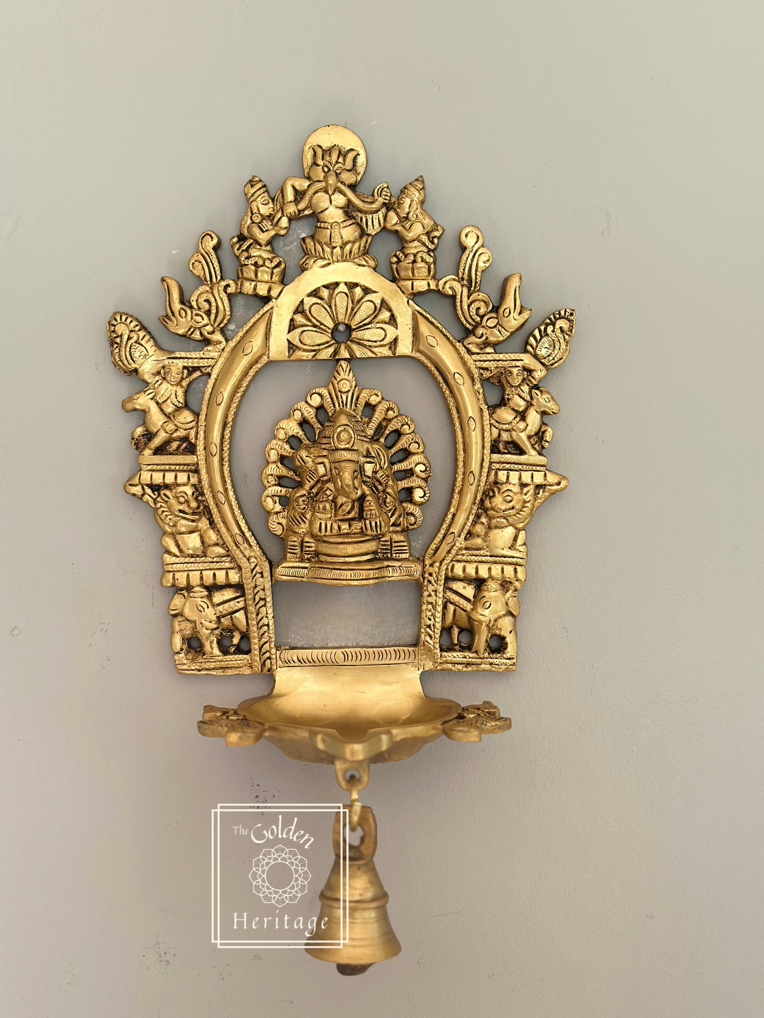 Sukhasana Ganapati with Prabhavali frame Diya