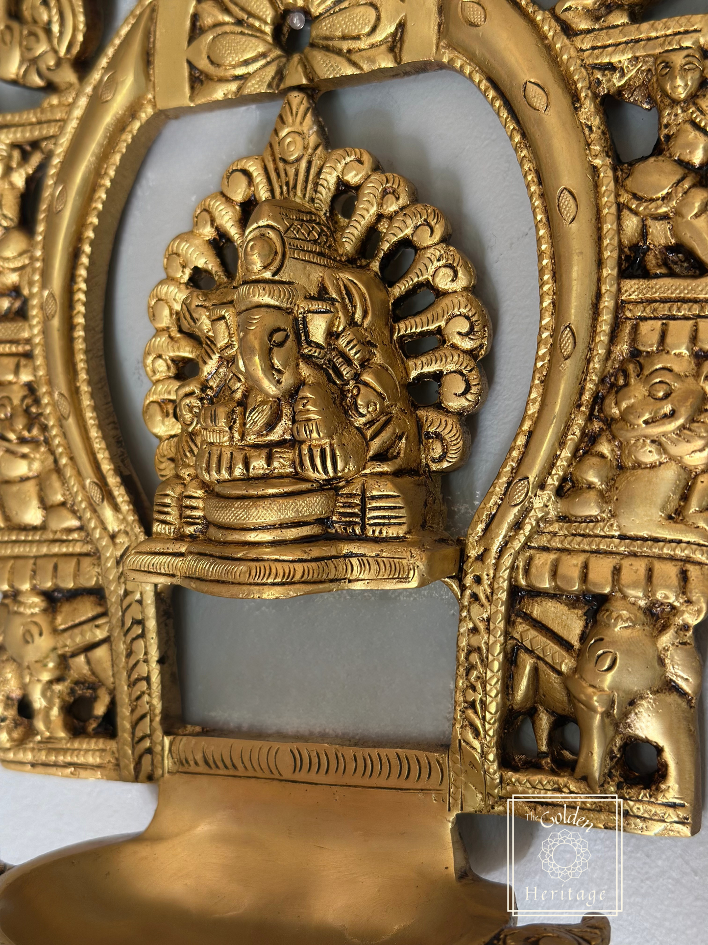 Sukhasana Ganapati with Prabhavali frame Diya