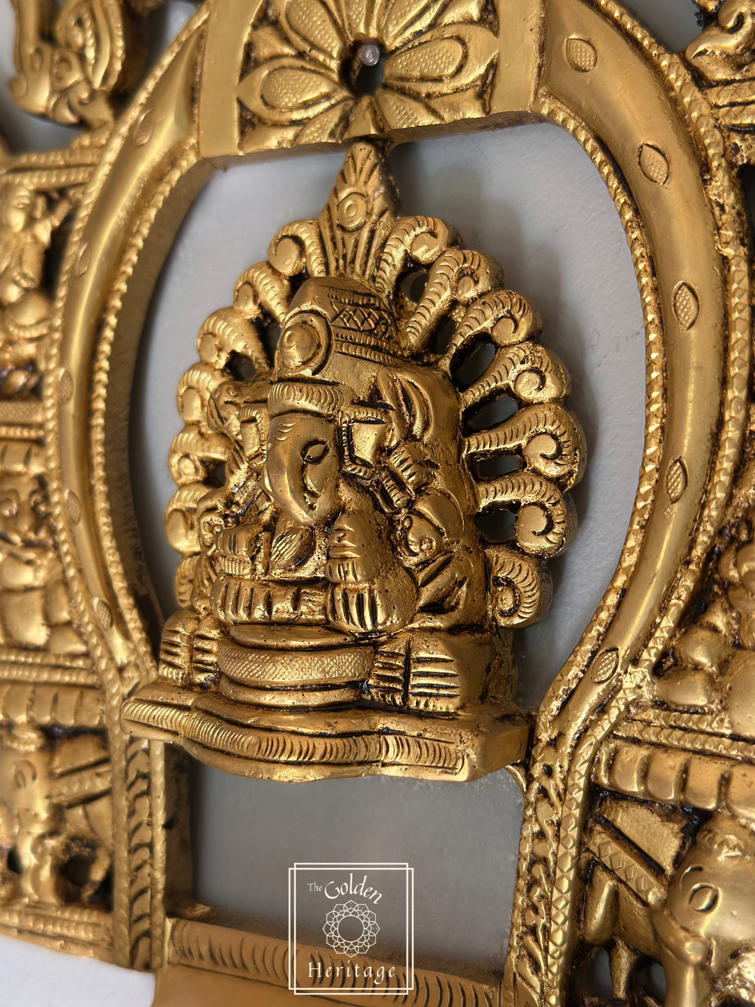 Sukhasana Ganapati with Prabhavali frame Diya