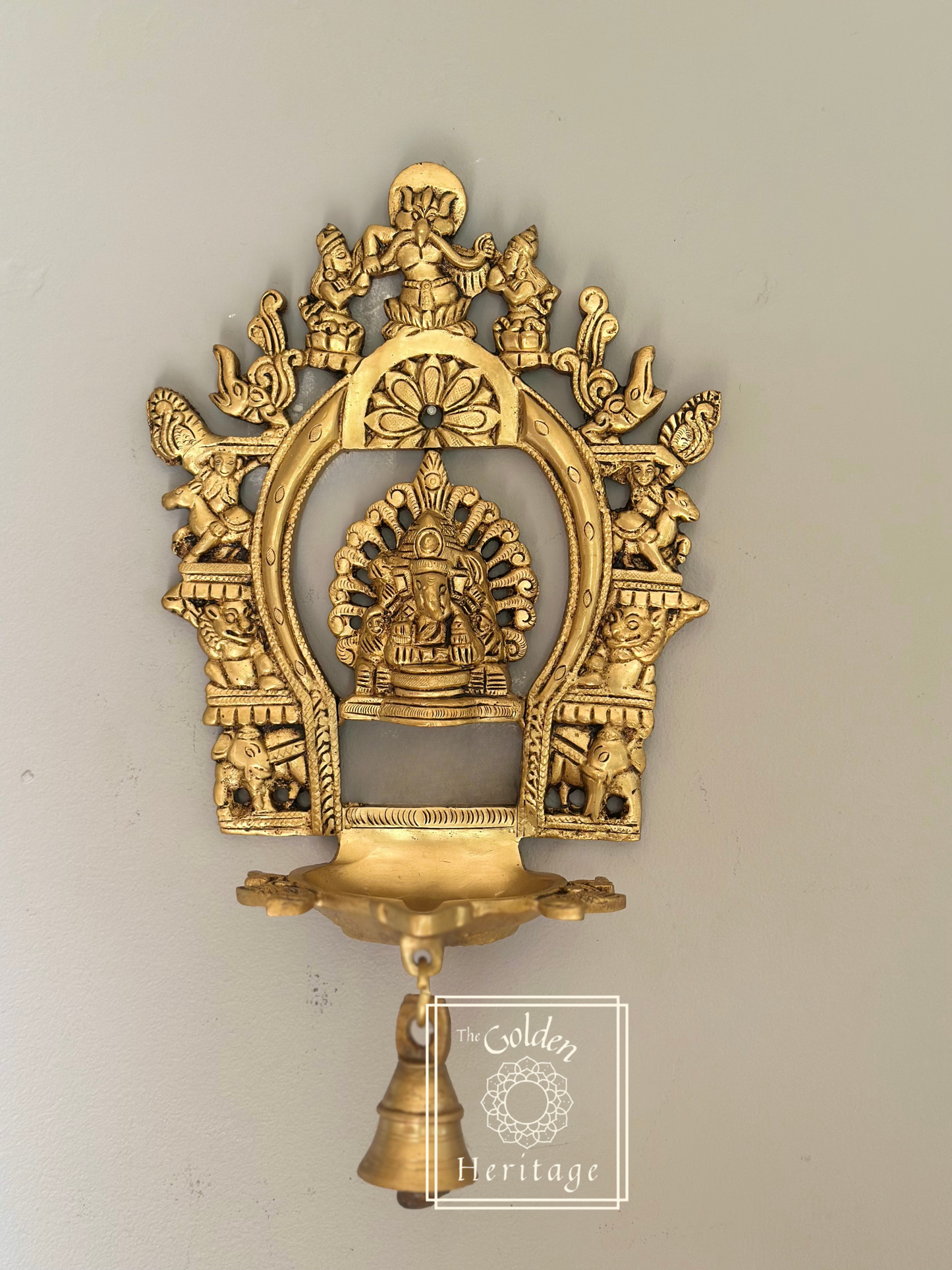 Sukhasana Ganapati with Prabhavali frame Diya