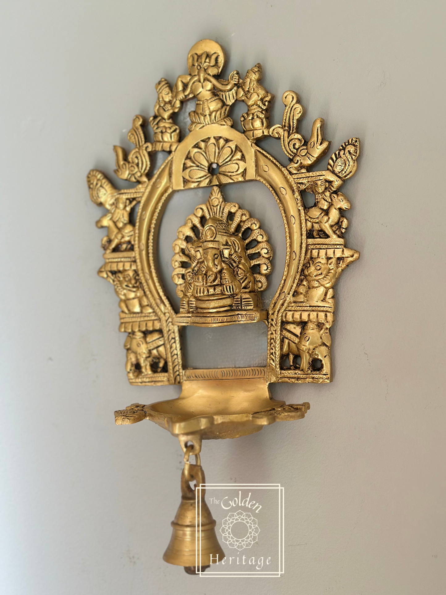 Sukhasana Ganapati with Prabhavali frame Diya