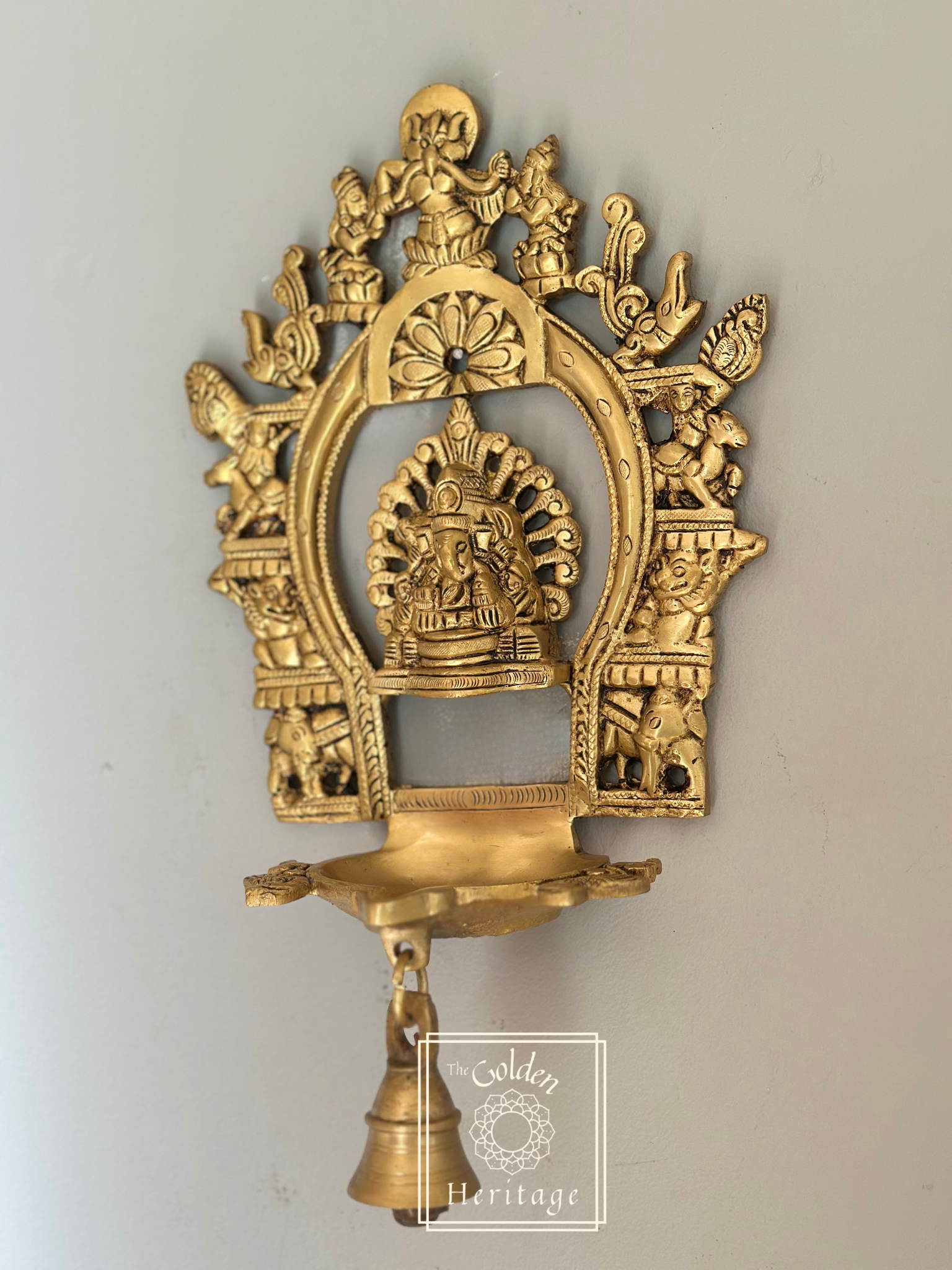 Sukhasana Ganapati with Prabhavali frame Diya